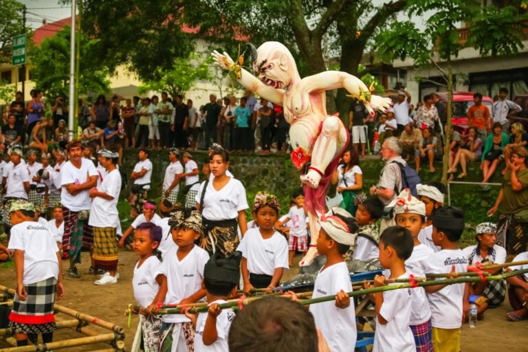 Traditional Balinese dance performance on an outdoor stage
